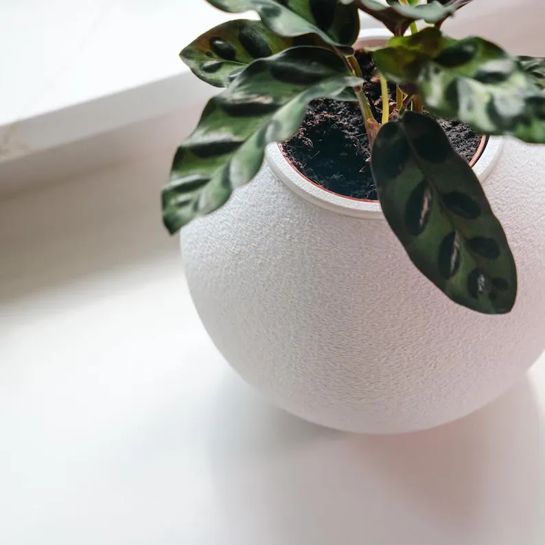 'The Wobble Pot' - A self balancing plant pot from Sliced Earth
