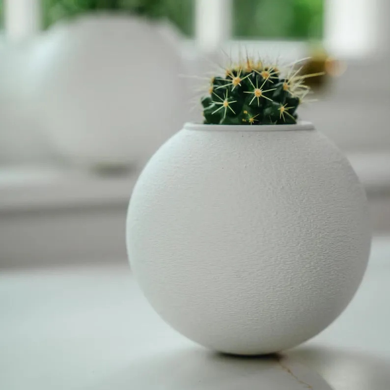 'The Wobble Pot' - A self balancing plant pot from Sliced Earth