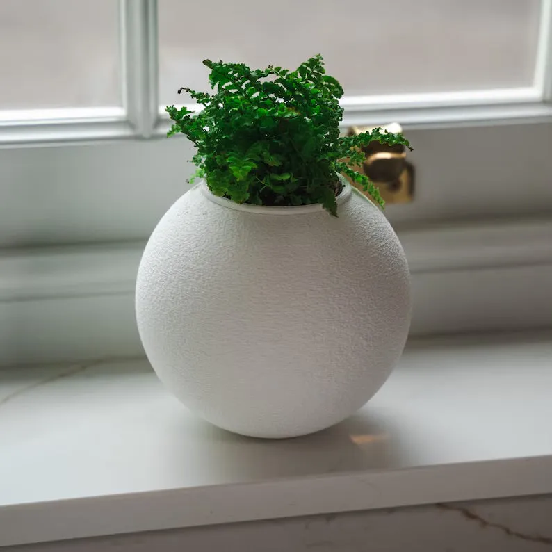 'The Wobble Pot' - A self balancing plant pot from Sliced Earth