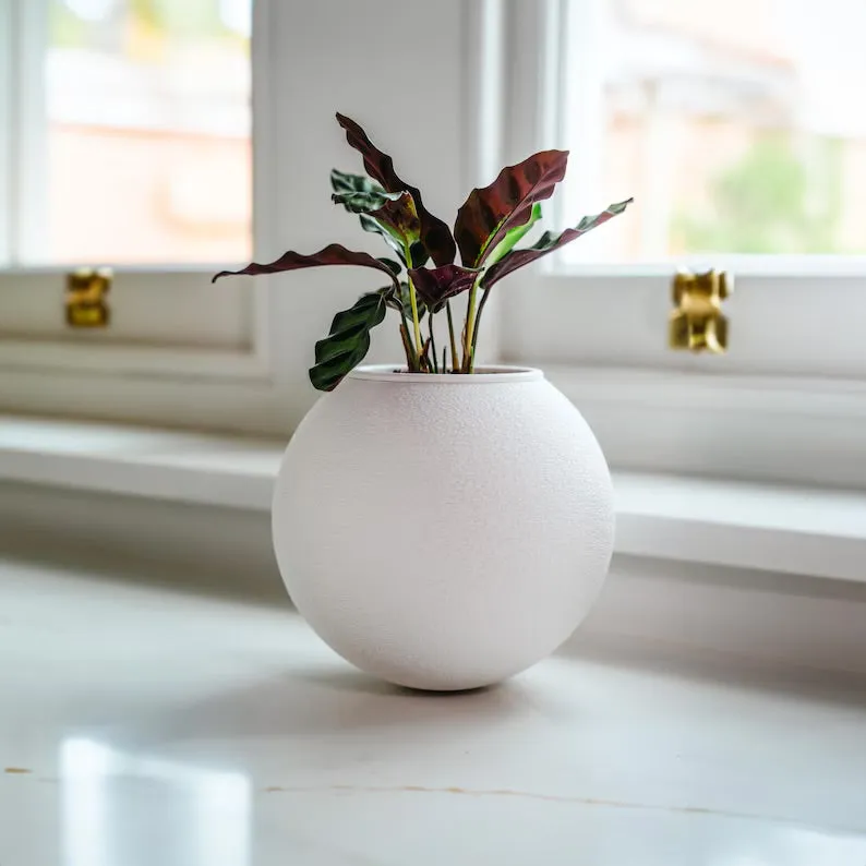 'The Wobble Pot' - A self balancing plant pot from Sliced Earth