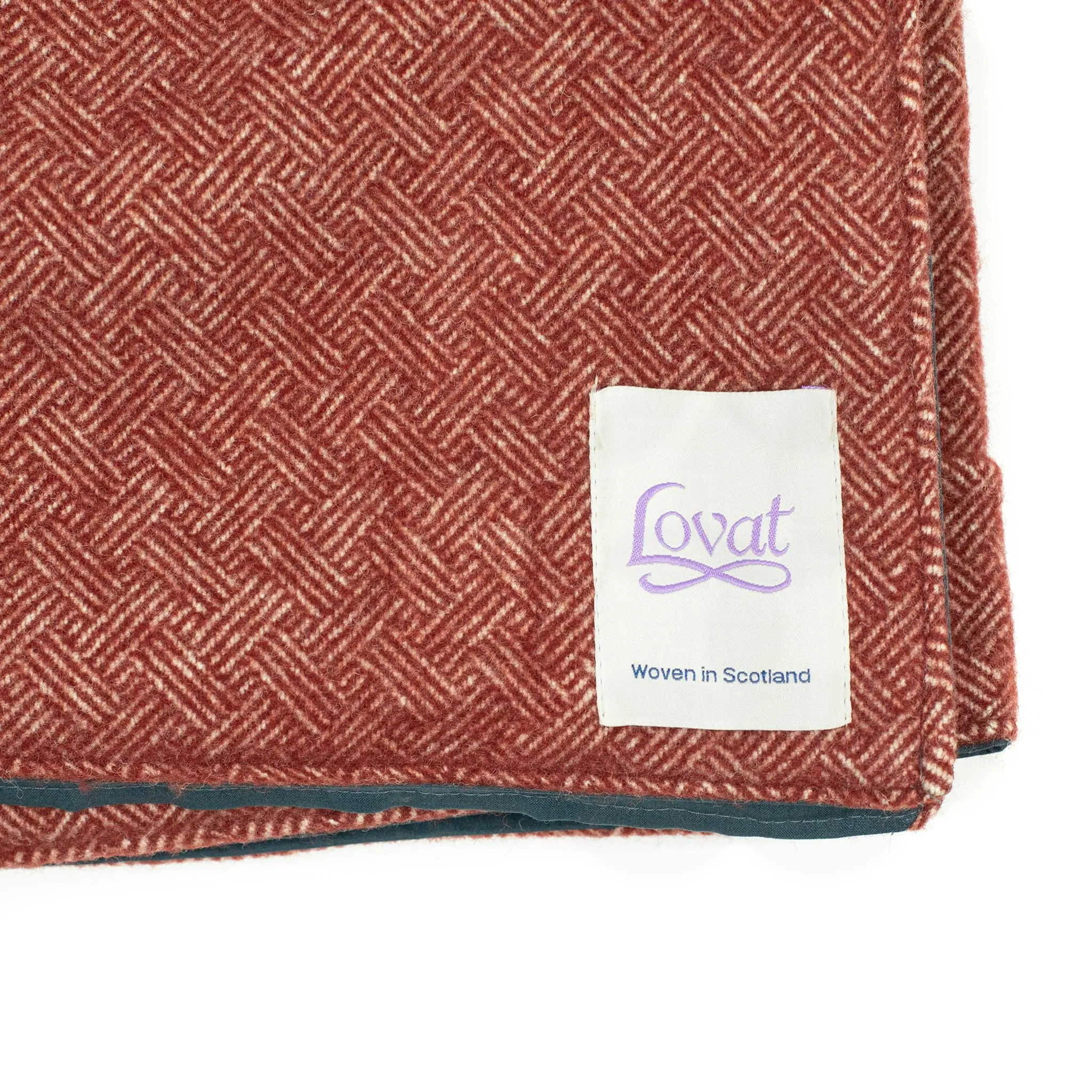 Waxed back picnic blanket in deco brick-red and ecru lambswool